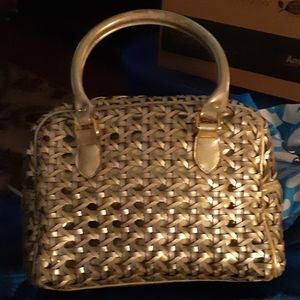 Gold Warren Reed purse